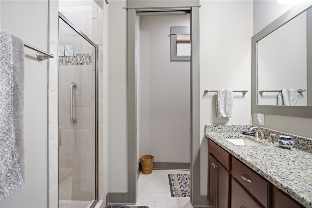 412 Walking Fern Way Seneca, SC 29672 - Photo 30 of 45 This bathroom features a contemporary vanity and a spacious shower.