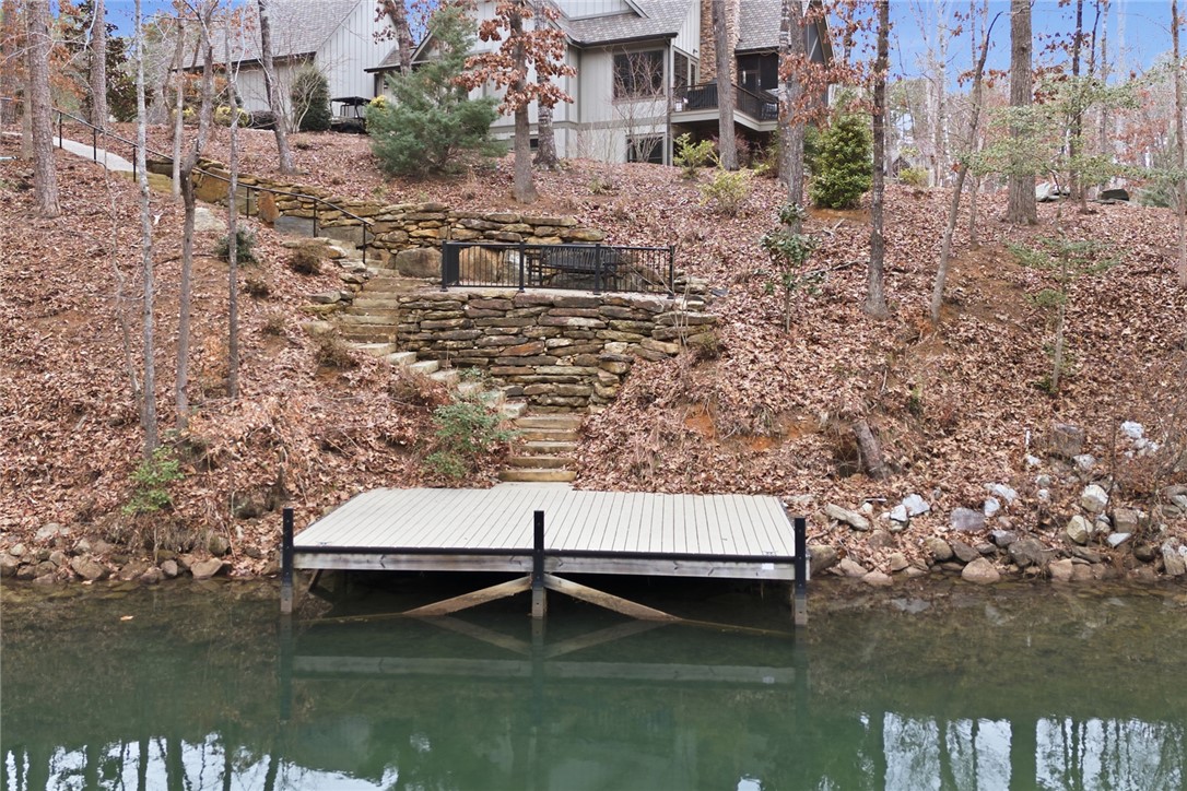 412 Walking Fern Way Seneca, SC 29672 - Photo 43 of 45 This serene waterfront property boasts a separate platform dock and a terraced path leading to the home.