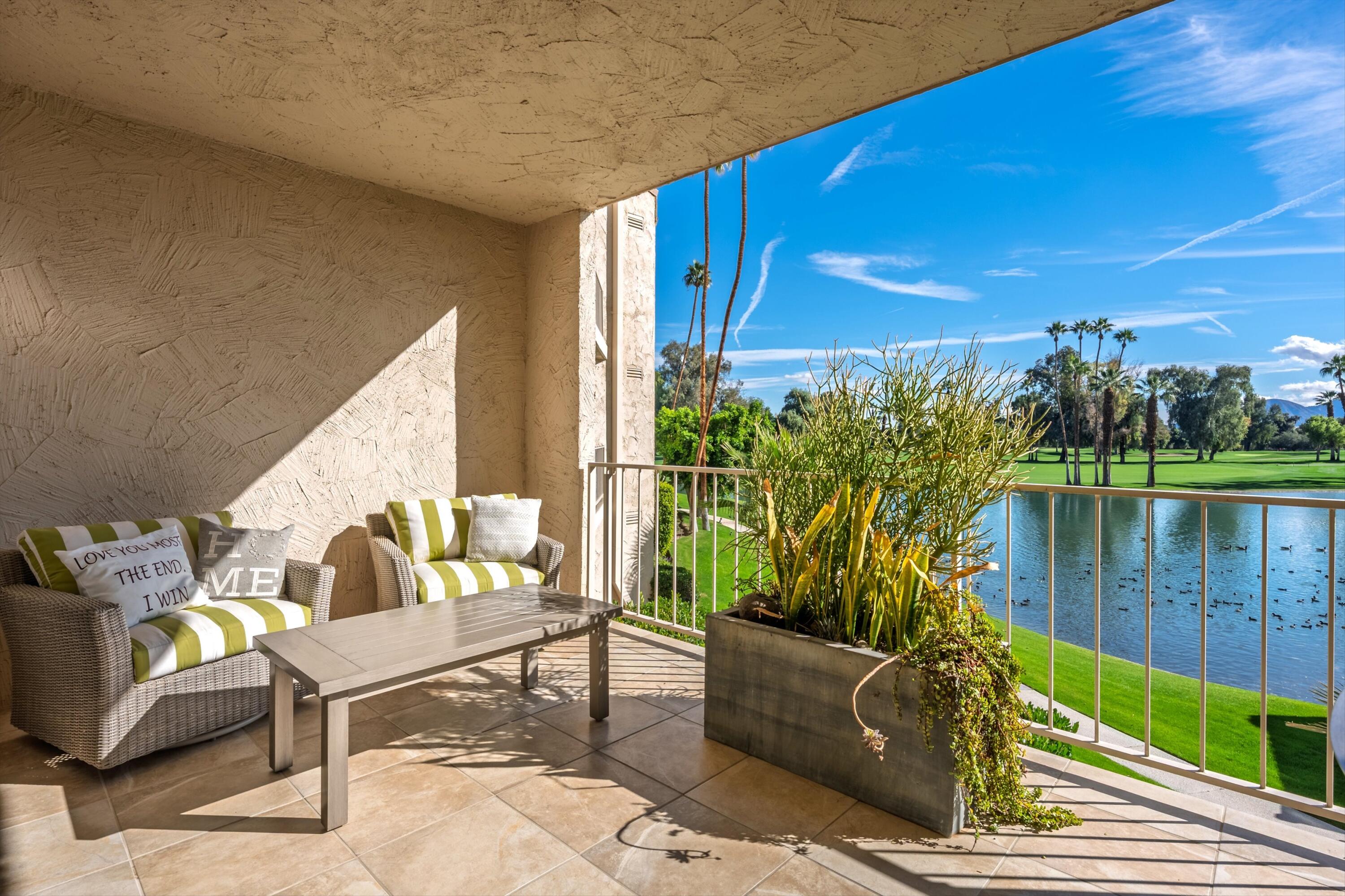 910 Island Drive, Unit 207 Rancho Mirage, CA 92270 - Photo 8 of 27 a outdoor living space with furniture