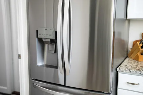 a close view of a utility room with washer and dryer