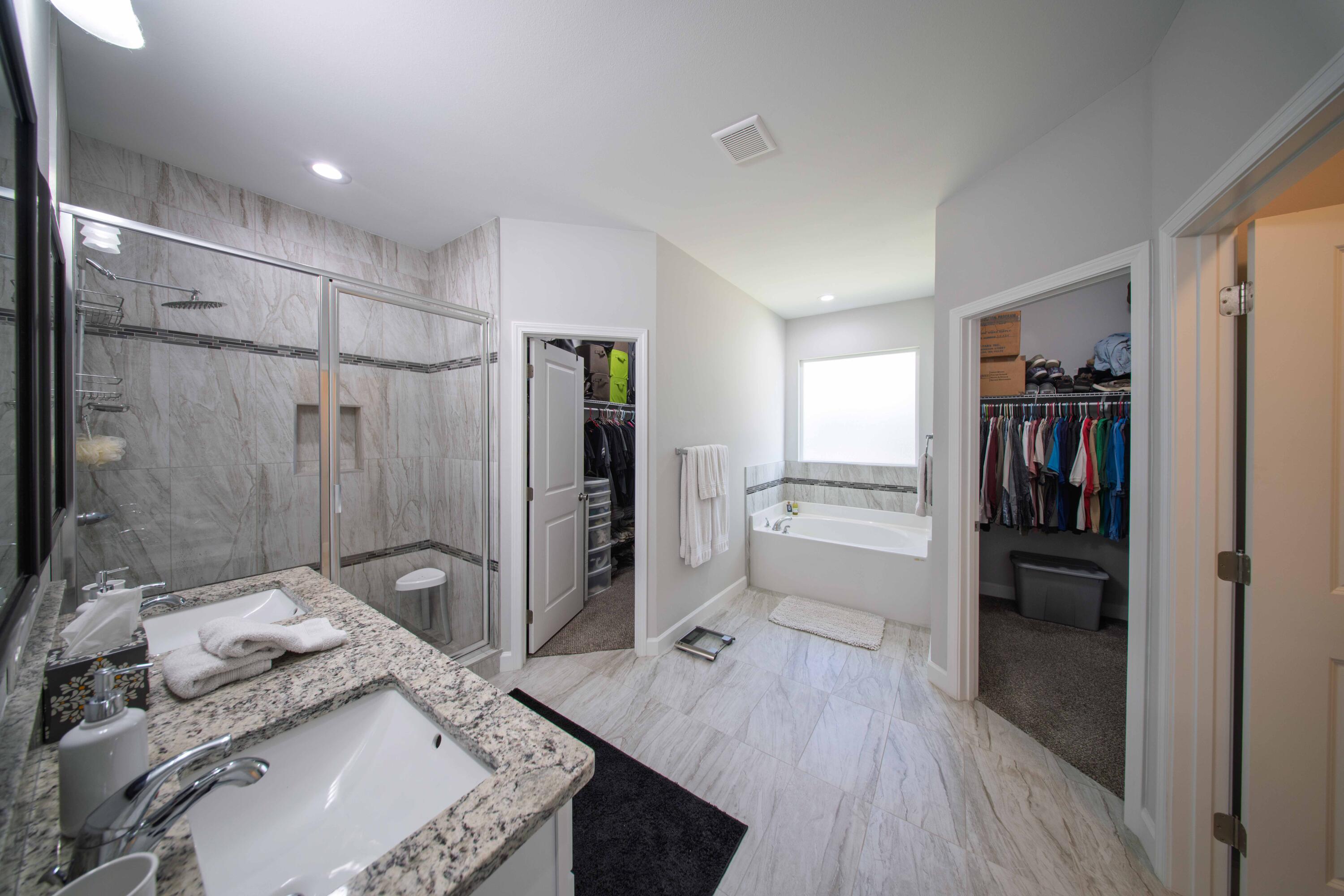 474 Sara Avenue Mary Esther, FL 32569 - Photo 29 of 46 a bathroom with a granite countertop sink toilet and shower