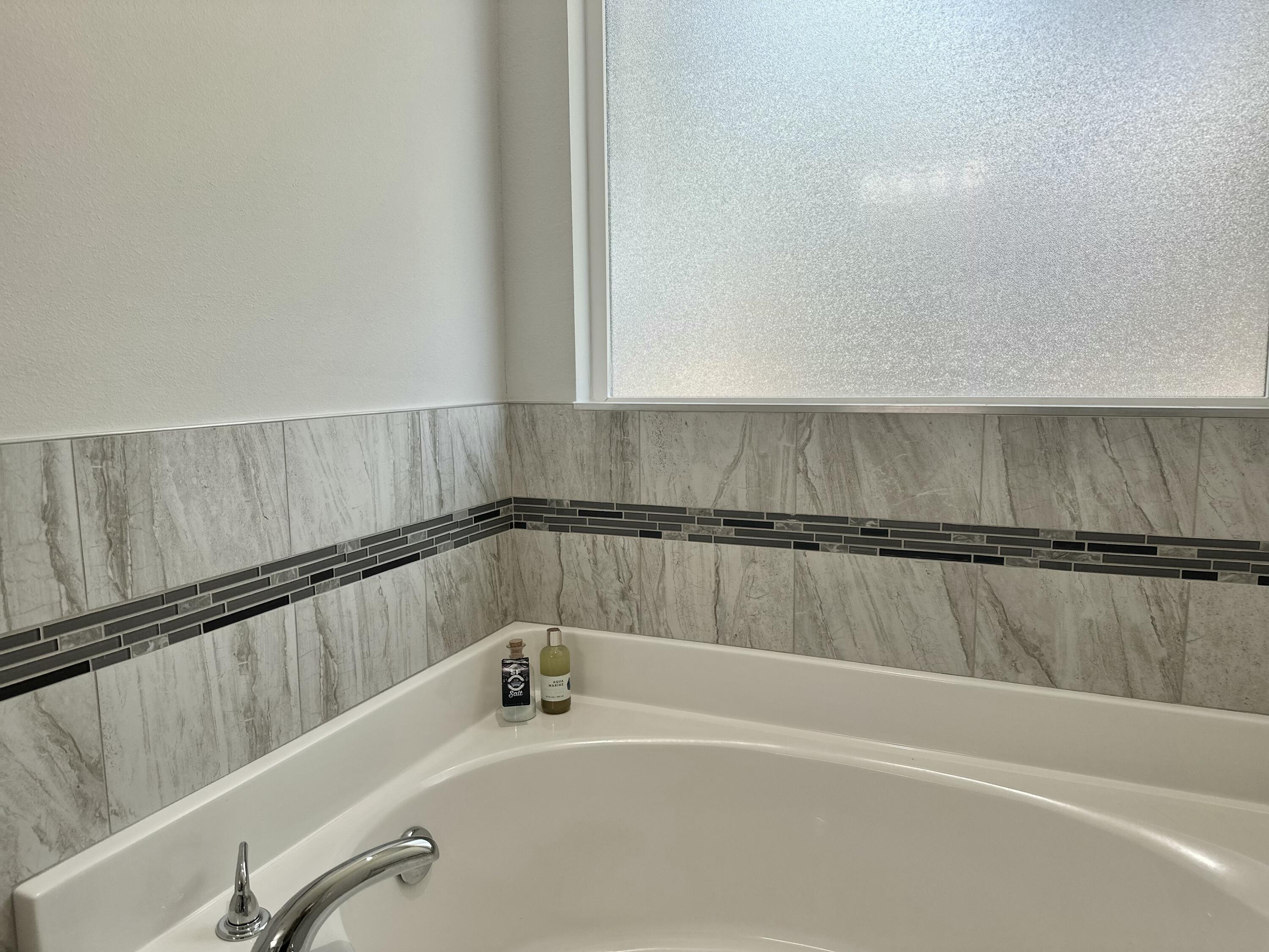 474 Sara Avenue Mary Esther, FL 32569 - Photo 30 of 46 a bathroom with a bathtub