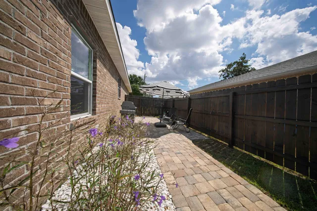 a view of entryway with window and chandelier