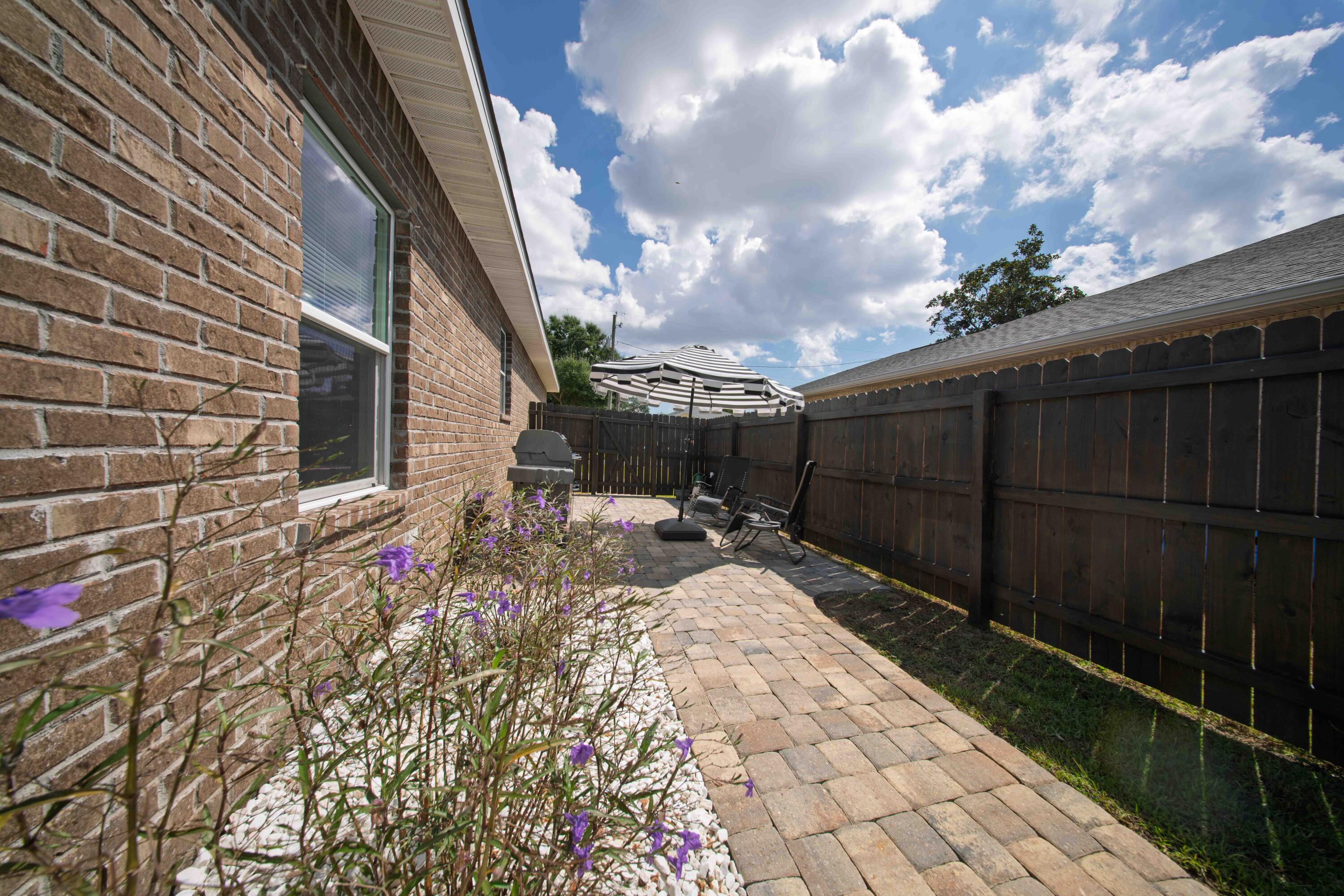 474 Sara Avenue Mary Esther, FL 32569 - Photo 36 of 46 a view of a backyard with pathway