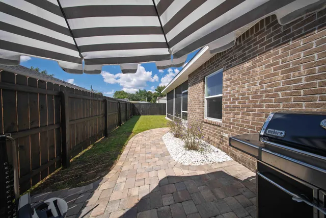 a view of swimming pool with backyard
