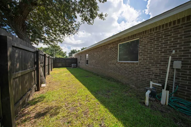 a view of a backyard with cabin