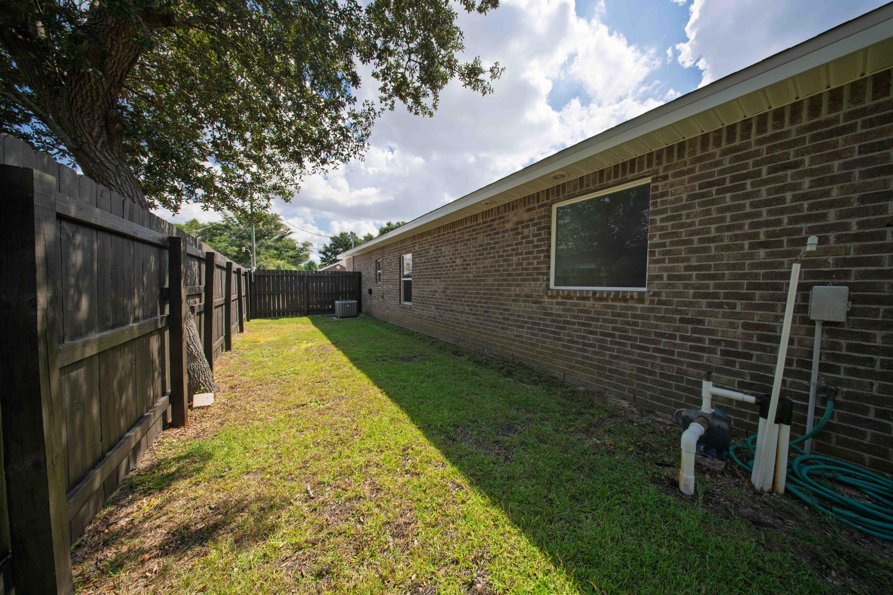 474 Sara Avenue Mary Esther, FL 32569 - Photo 39 of 46 a view of swimming pool with backyard