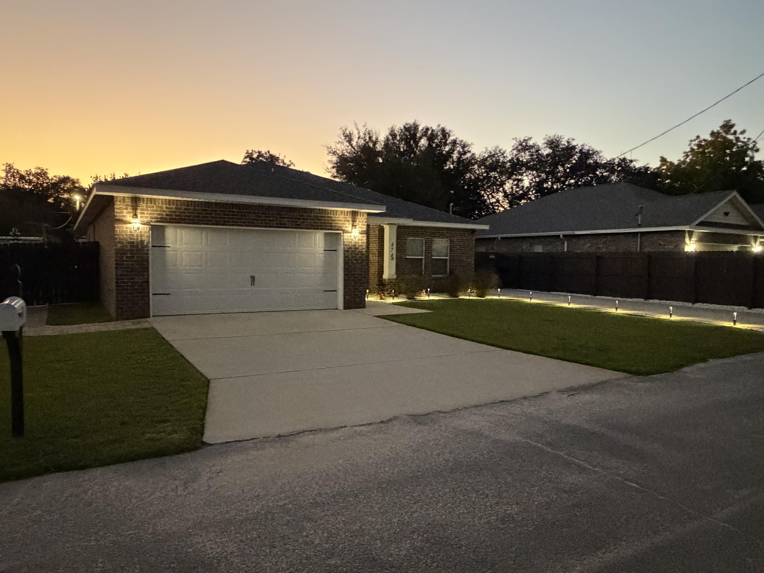474 Sara Avenue Mary Esther, FL 32569 - Photo 4 of 46 a view of backyard with trampoline
