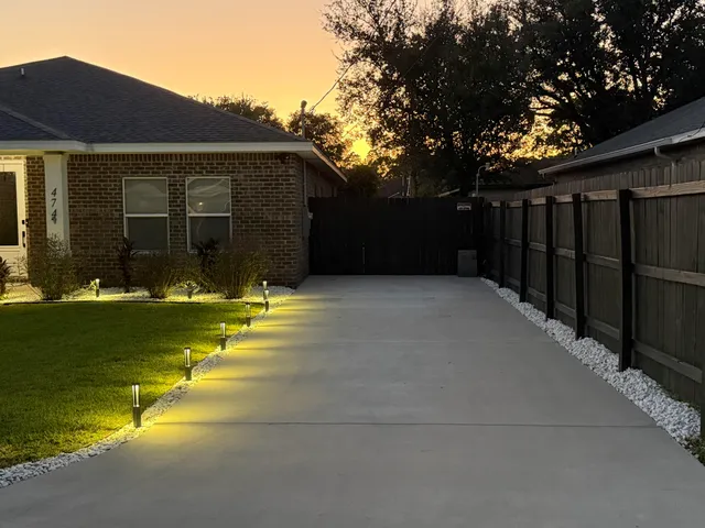 a view of swimming pool with an outdoor seating