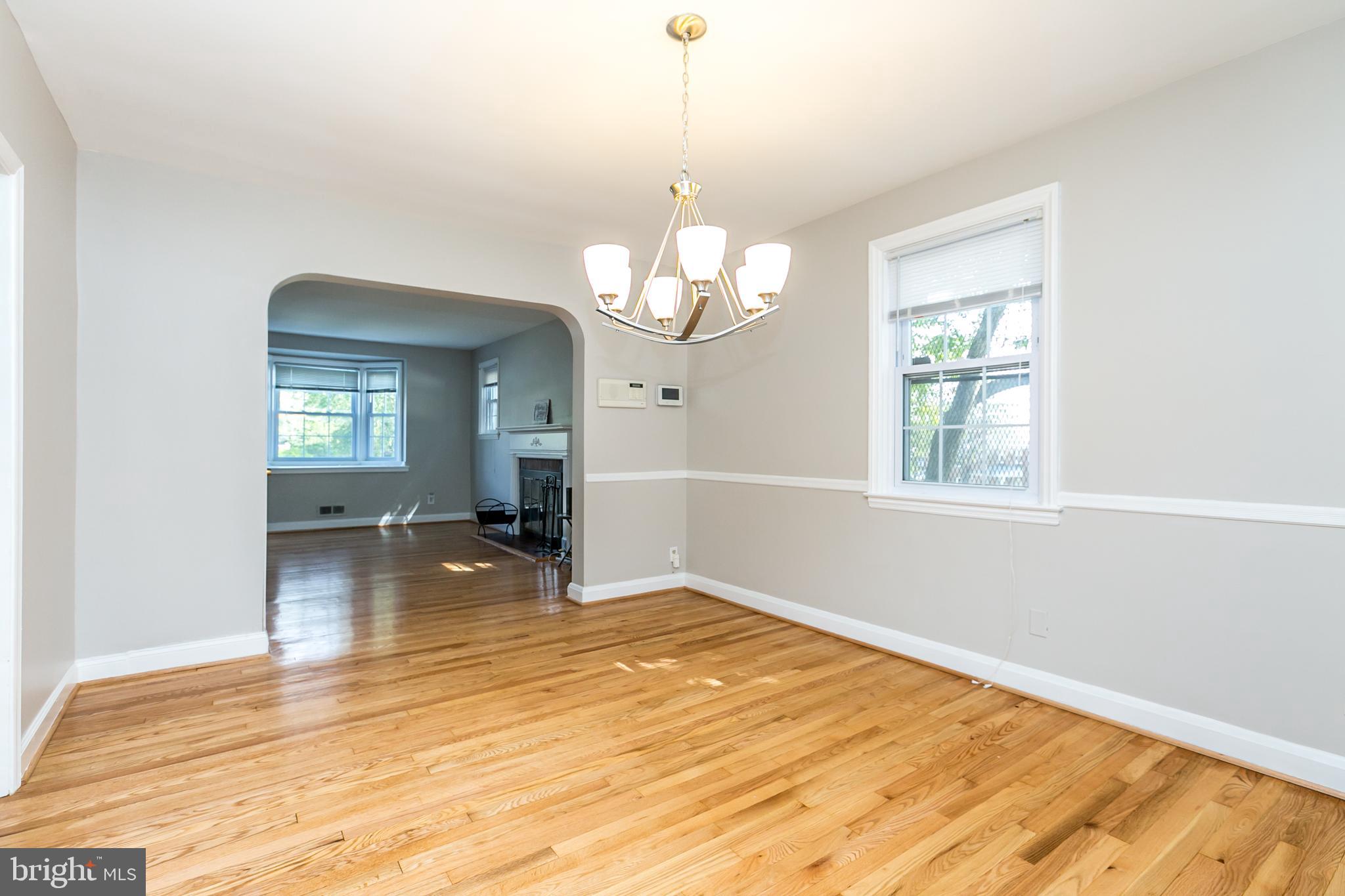 3600 Delverne Road Baltimore, MD 21218 - Photo 11 of 30 Dining room has a new chandelier, chair rail