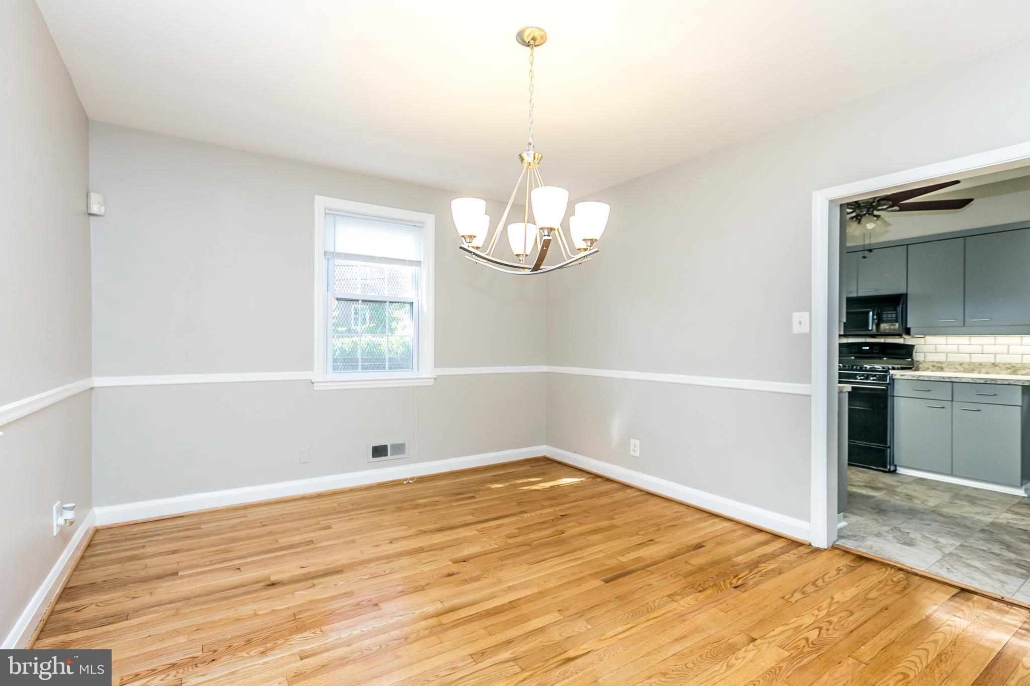 3600 Delverne Road Baltimore, MD 21218 - Photo 13 of 30 To large window in bright and spacious dr