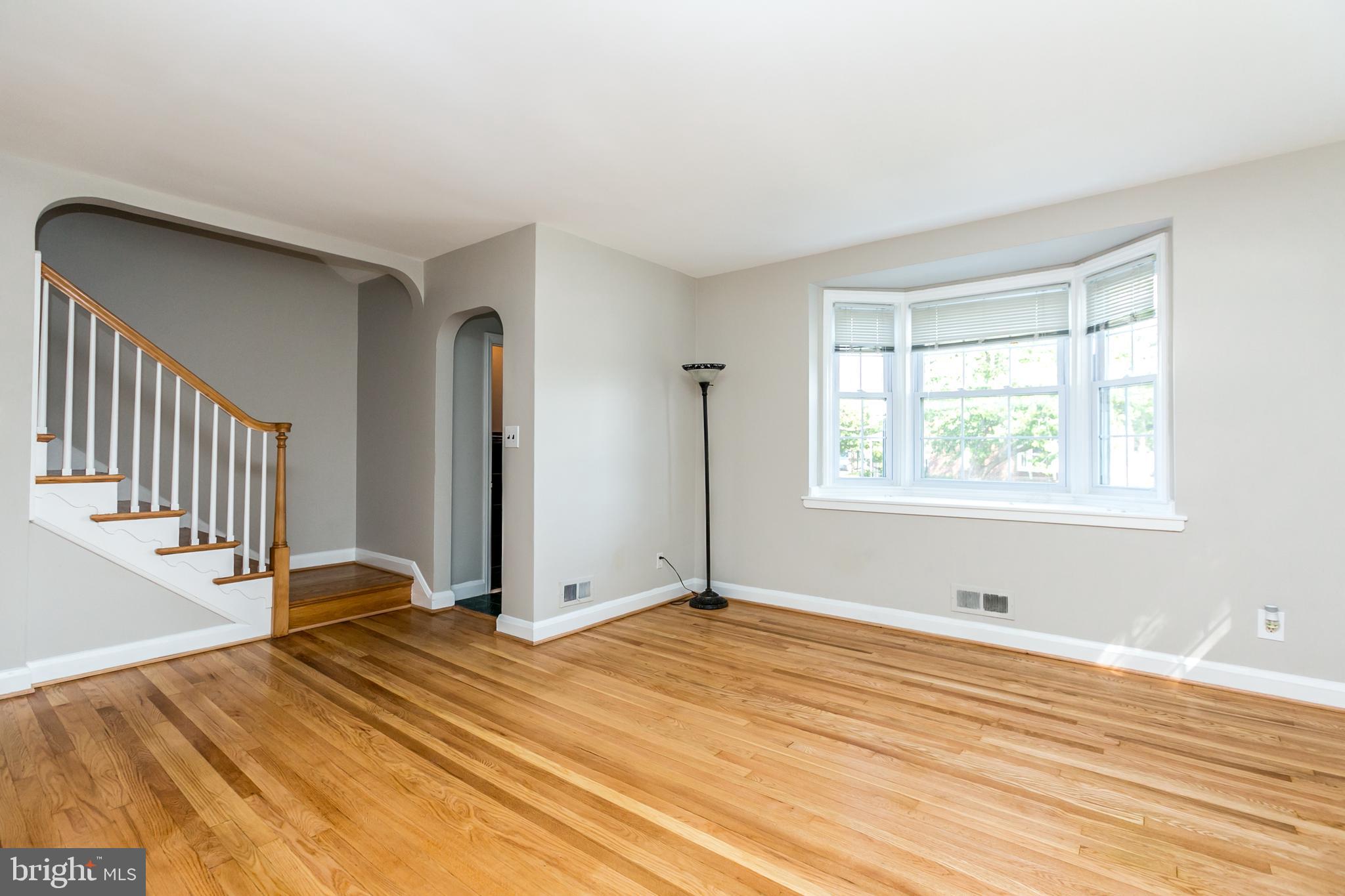 3600 Delverne Road Baltimore, MD 21218 - Photo 14 of 30 Open staircase & bow window in Lr