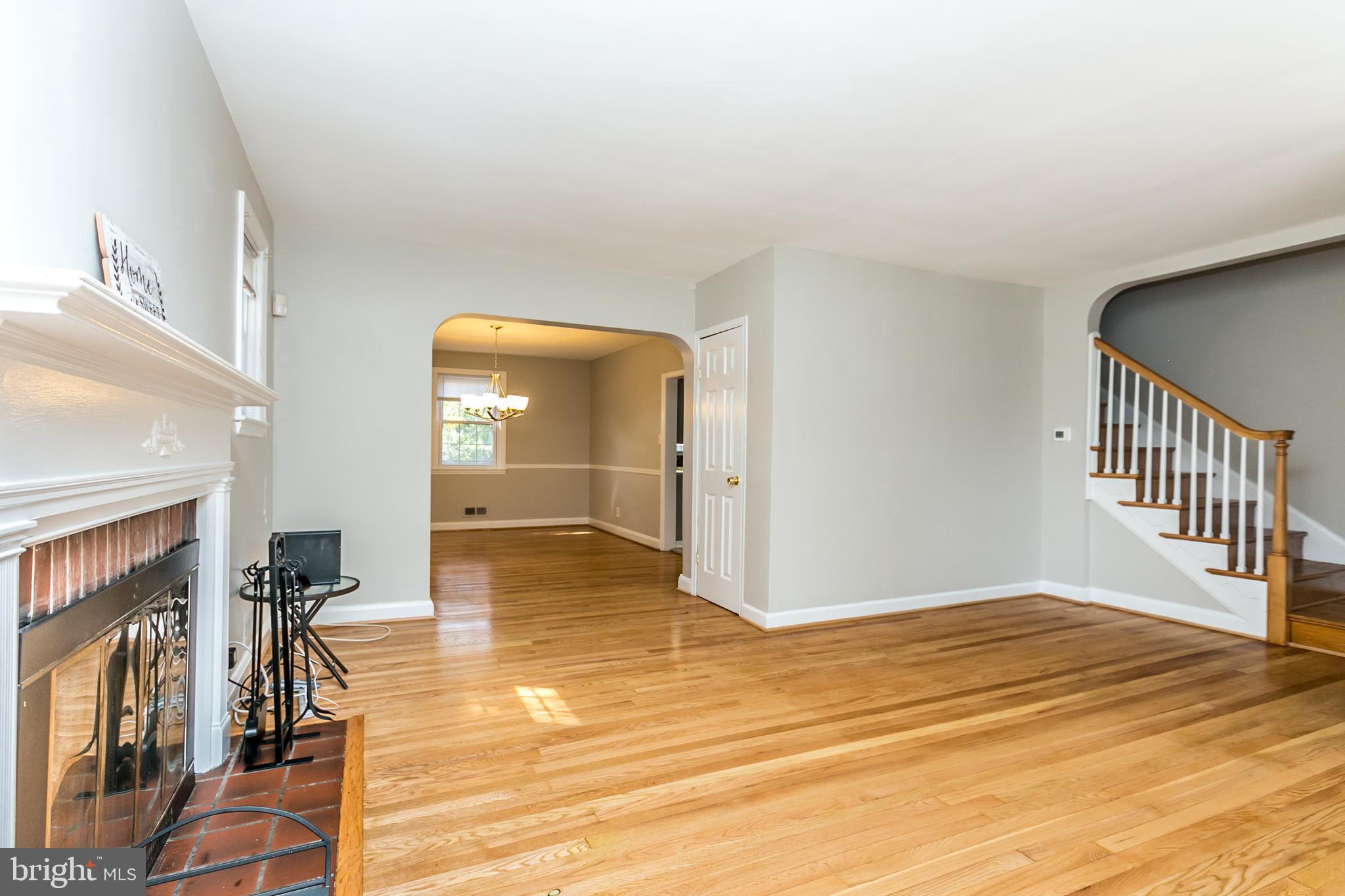 3600 Delverne Road Baltimore, MD 21218 - Photo 15 of 30 Refinished floors and wood burning fireplace, LR