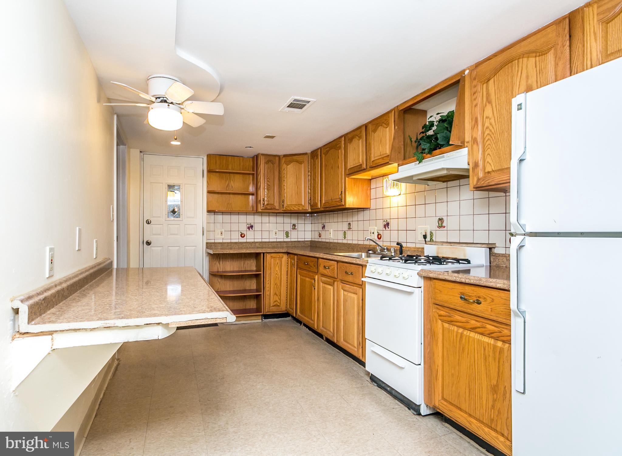 3600 Delverne Road Baltimore, MD 21218 - Photo 27 of 30 Large 2nd kitchen with laundry in basement