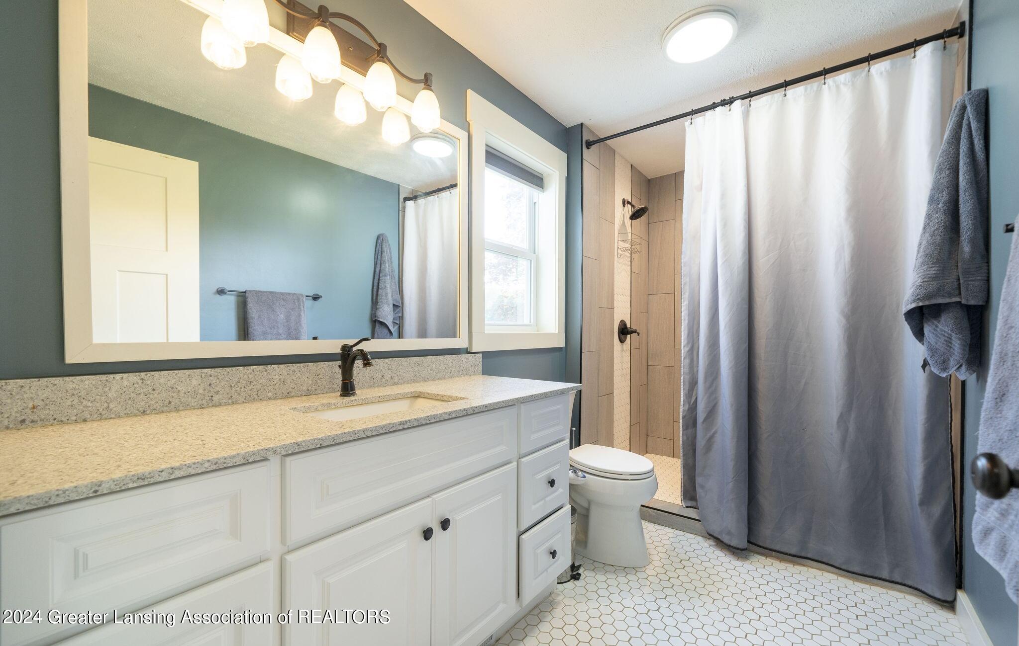 9885 Peck Lake Road Lowell, MI 49331 - Photo 28 of 56 Bathroom