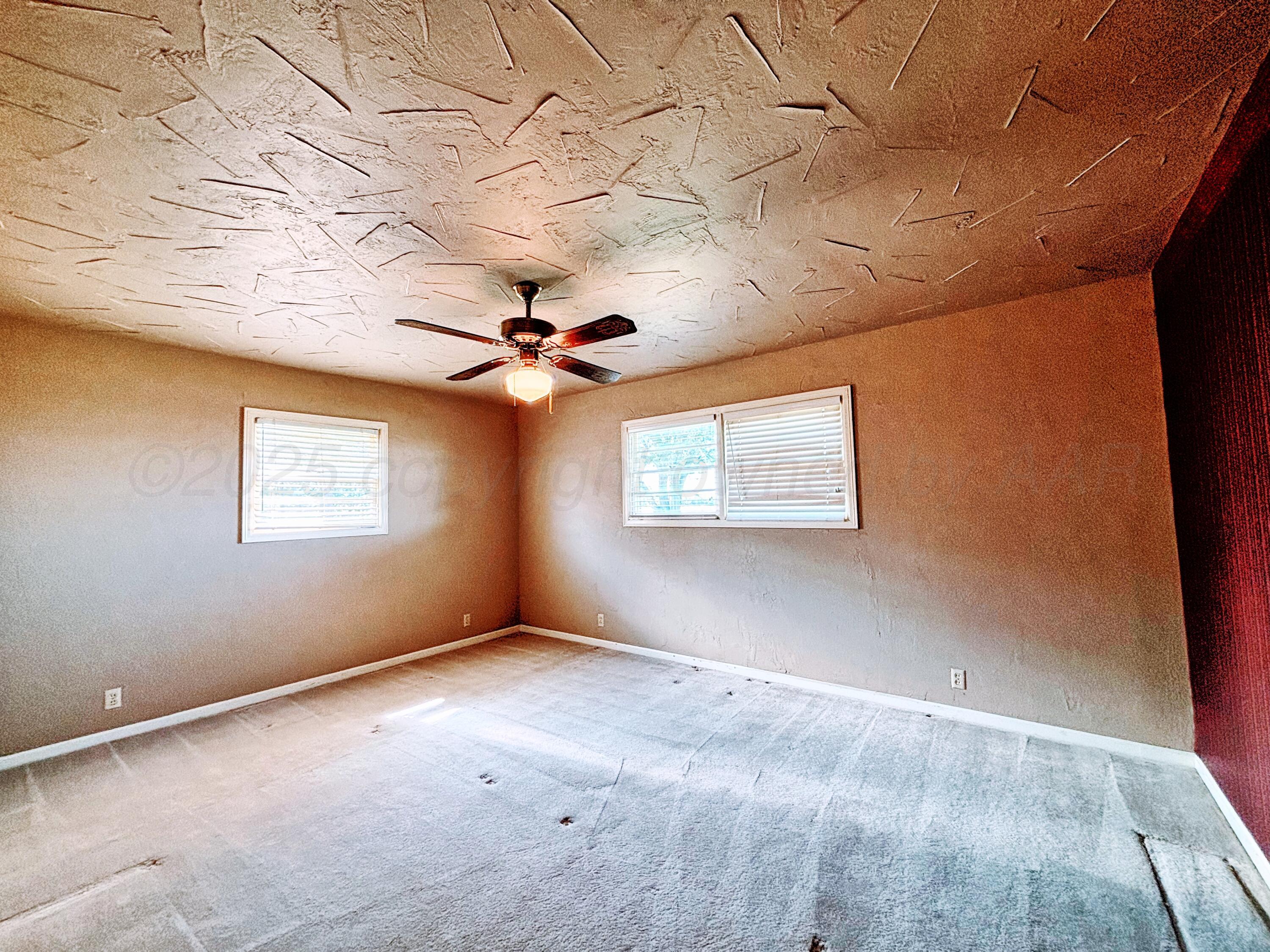 2301 West W Loop Perryton, TX 79070 - Photo 20 of 36 Conner house bedroom