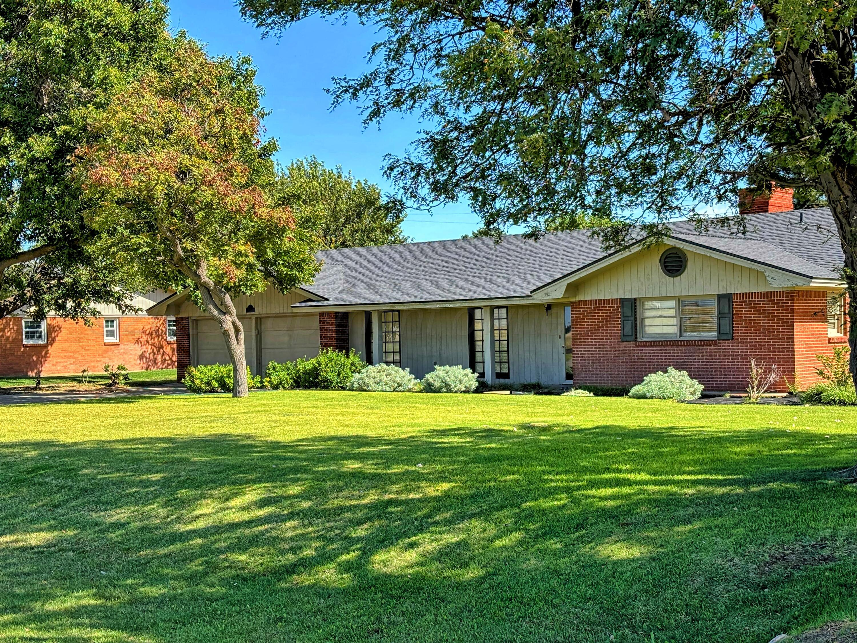 2301 West W Loop Perryton, TX 79070 - Photo 2 of 36 Conner house front exterior angle