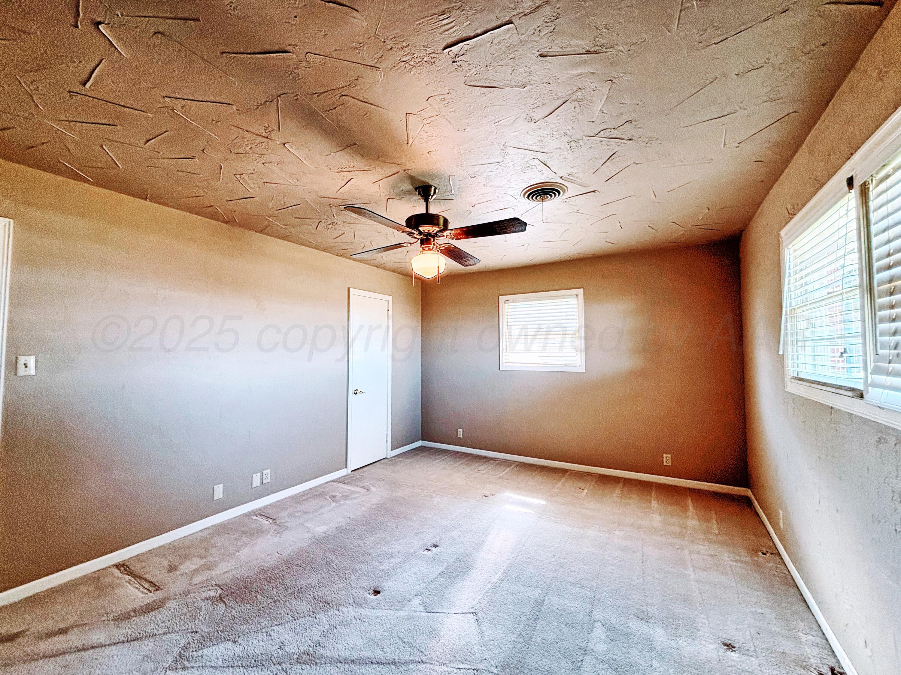 2301 West W Loop Perryton, TX 79070 - Photo 21 of 36 Conner house bedroom 2