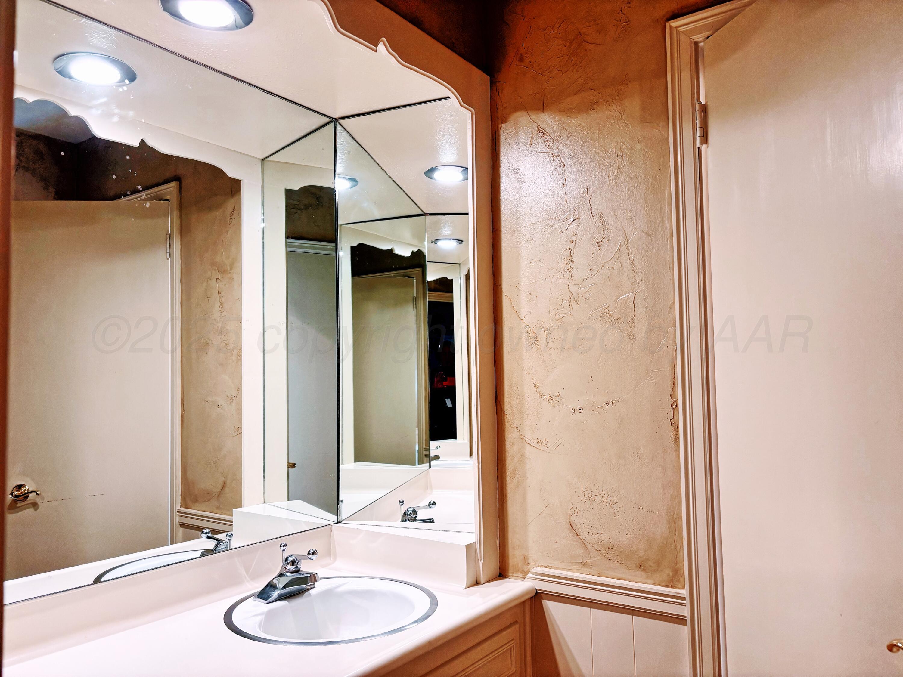 2301 West W Loop Perryton, TX 79070 - Photo 22 of 36 Conner house vanity 2