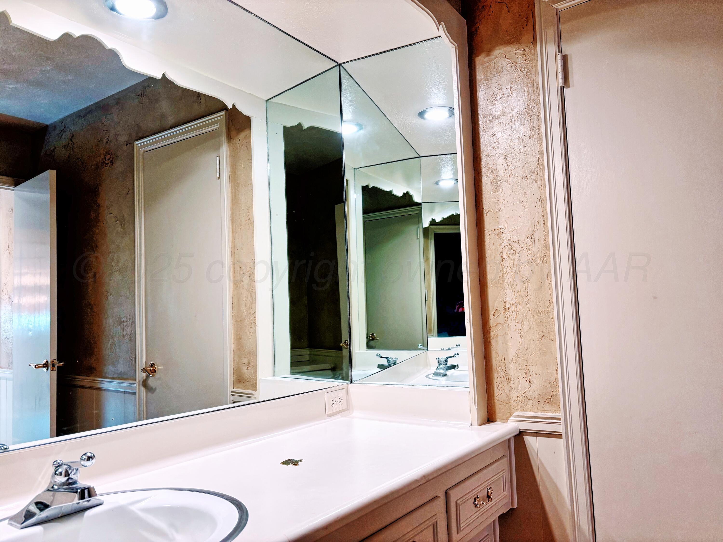 2301 West W Loop Perryton, TX 79070 - Photo 24 of 36 Conner house vanity