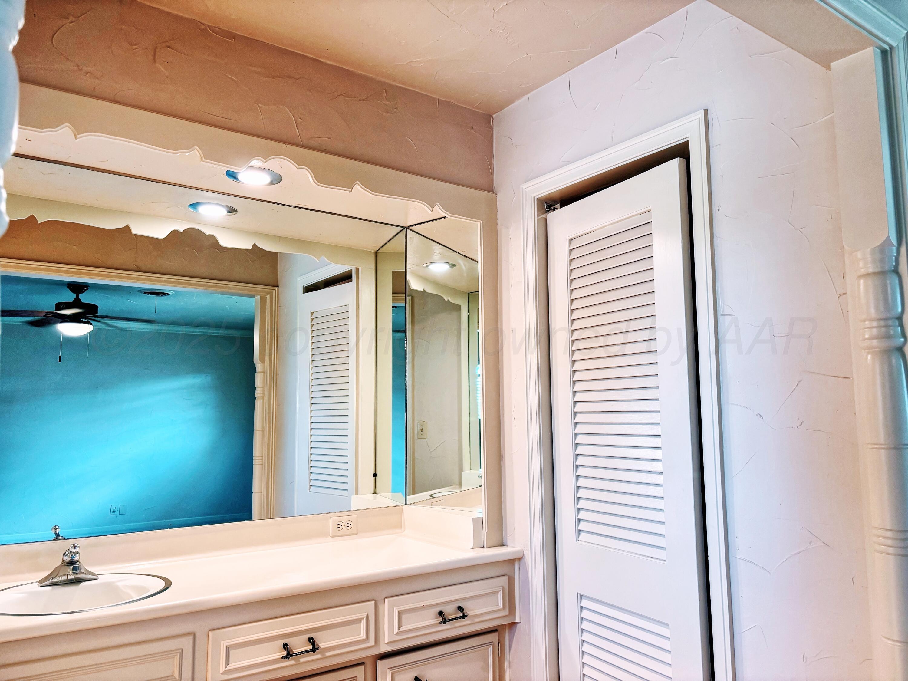 2301 West W Loop Perryton, TX 79070 - Photo 27 of 36 Conner house vanity 3