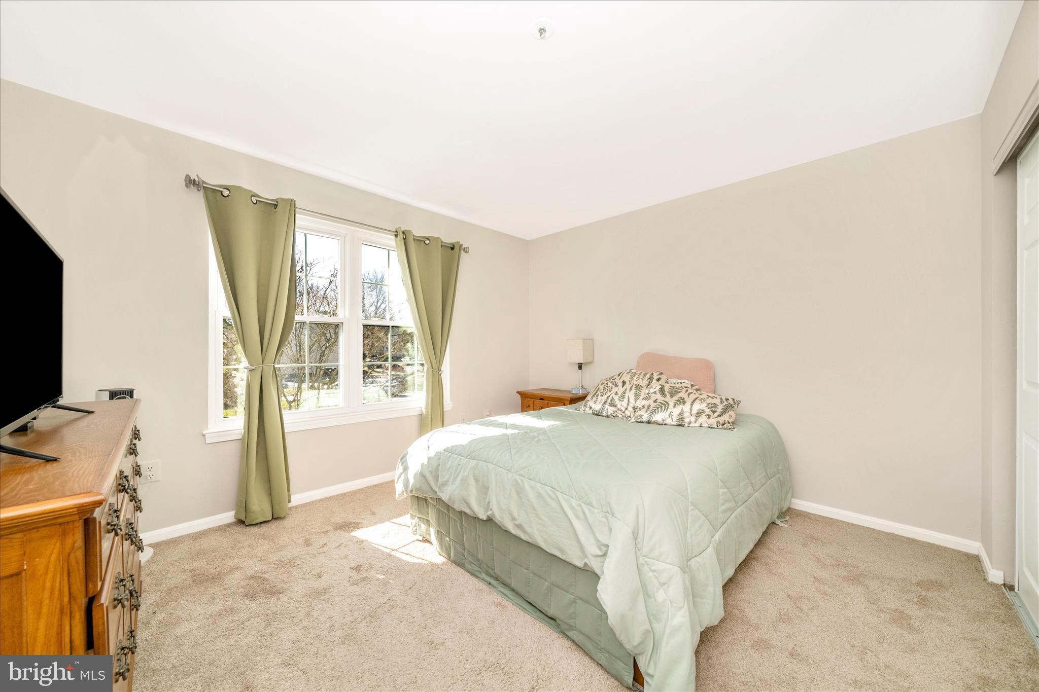 2513 McVeary Court, Unit 10AC Silver Spring, MD 20906 - Photo 24 of 55 Primary Bedroom