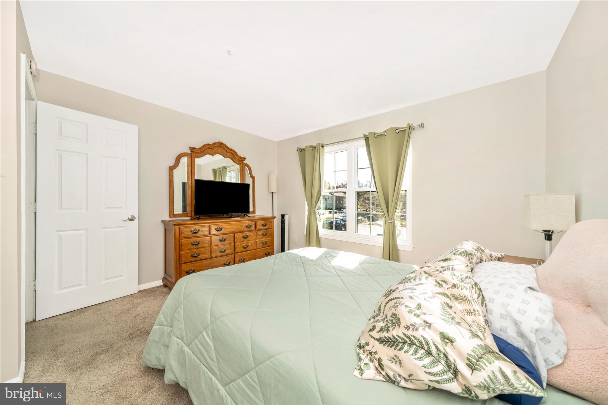 2513 McVeary Court, Unit 10AC Silver Spring, MD 20906 - Photo 25 of 55 Primary Bedroom
