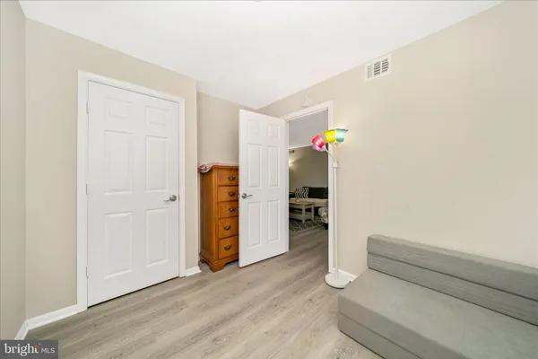 a view of balcony with wooden floor