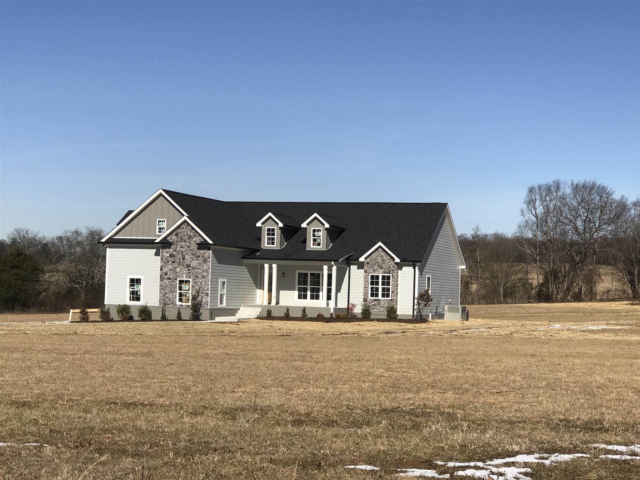 759 Philadelphia Road Lebanon, TN 37087 - Photo 2 of 21 a front view of a house with large trees
