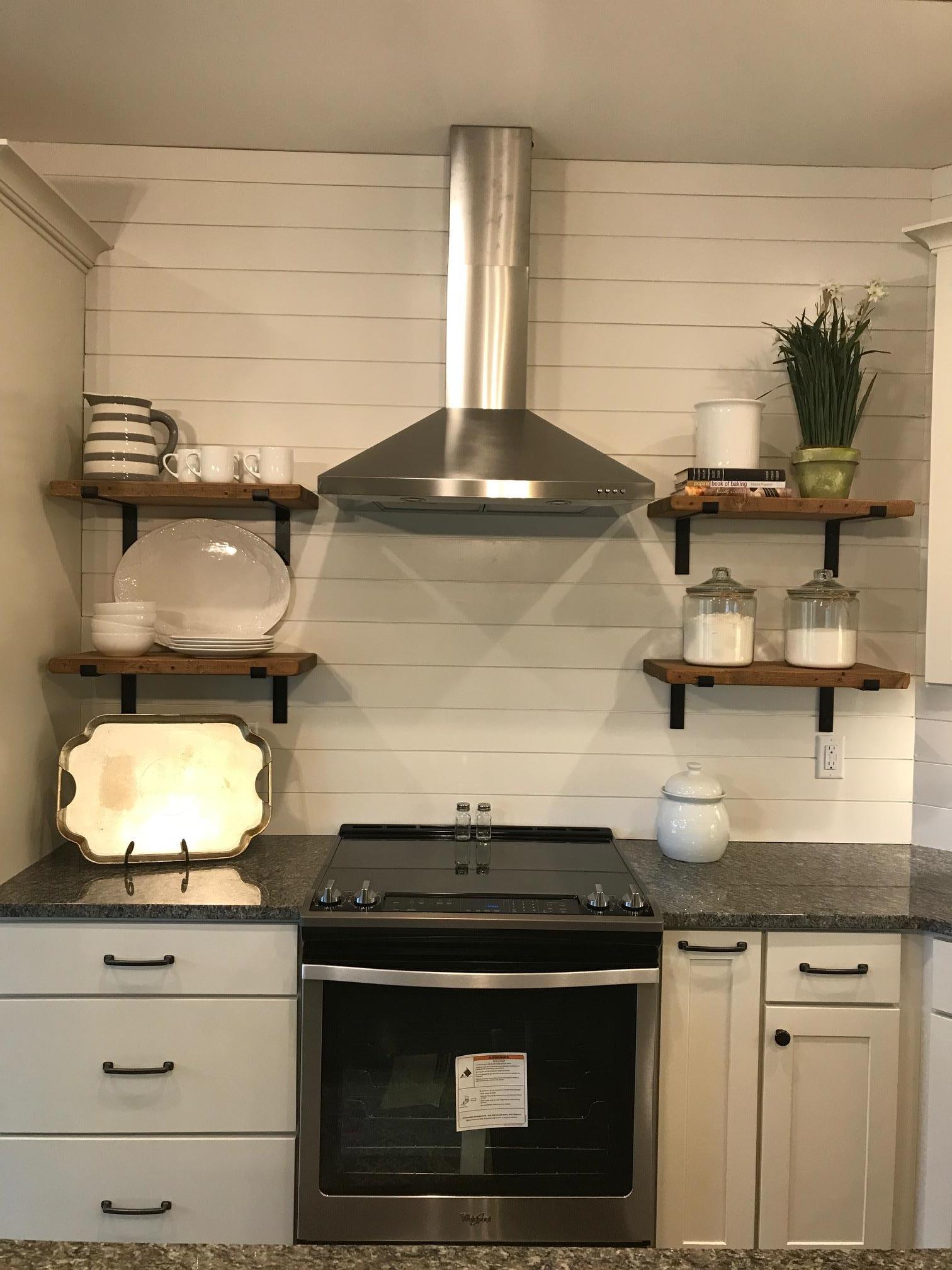 759 Philadelphia Road Lebanon, TN 37087 - Photo 12 of 21 a stove top oven sitting inside of a kitchen