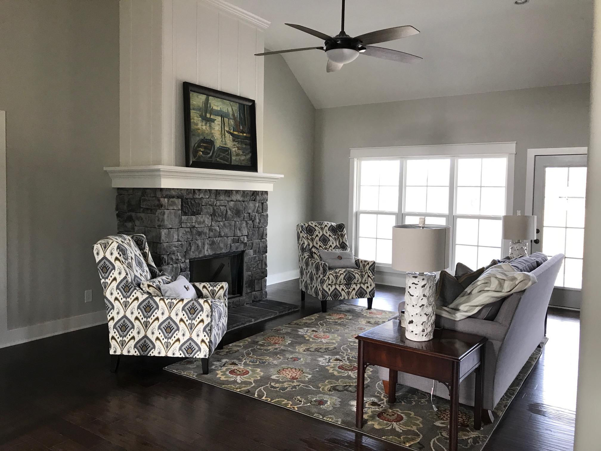 759 Philadelphia Road Lebanon, TN 37087 - Photo 13 of 21 a living room with furniture and a fireplace
