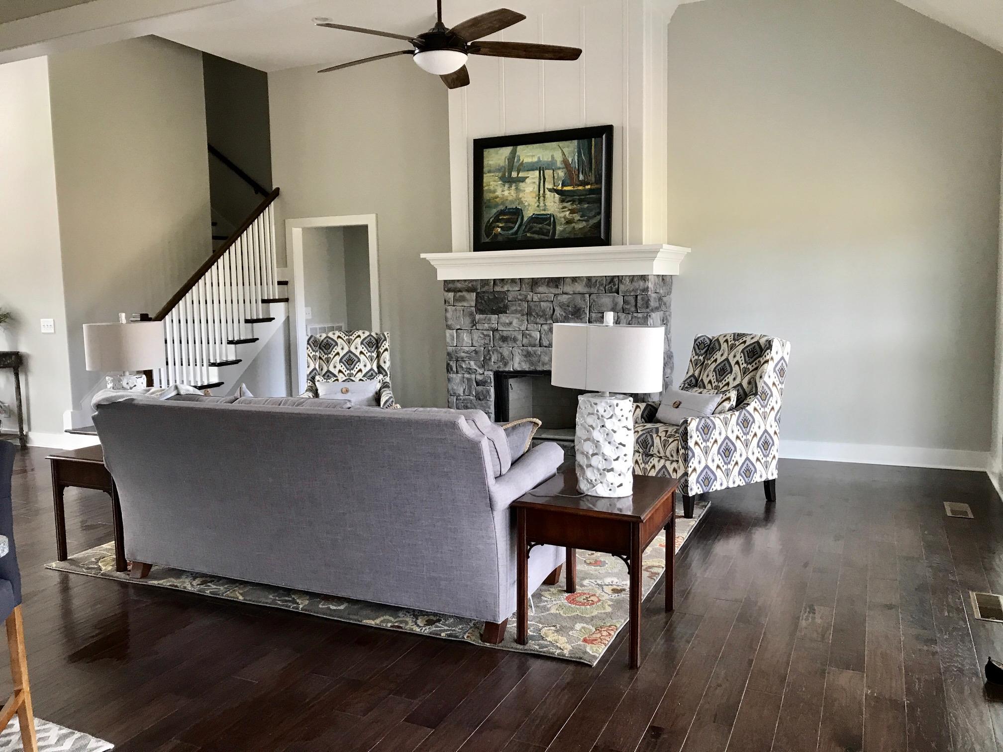 759 Philadelphia Road Lebanon, TN 37087 - Photo 14 of 21 a living room with furniture a fireplace and a flat screen tv