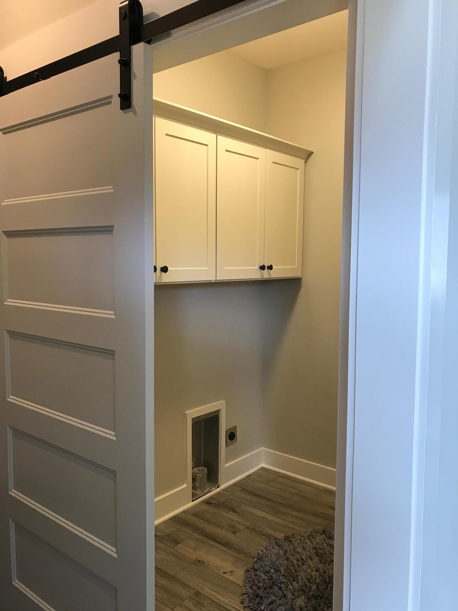 759 Philadelphia Road Lebanon, TN 37087 - Photo 20 of 21 a view of storage and utility room with wooden floor