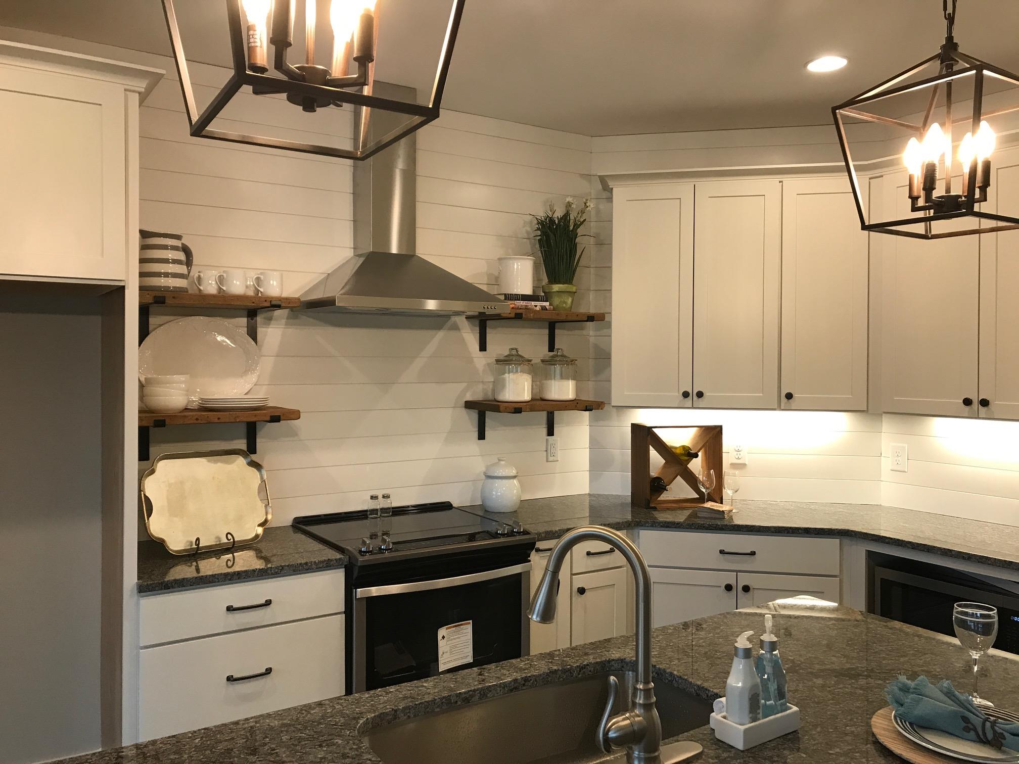 759 Philadelphia Road Lebanon, TN 37087 - Photo 9 of 21 a kitchen with granite countertop a stove and a sink