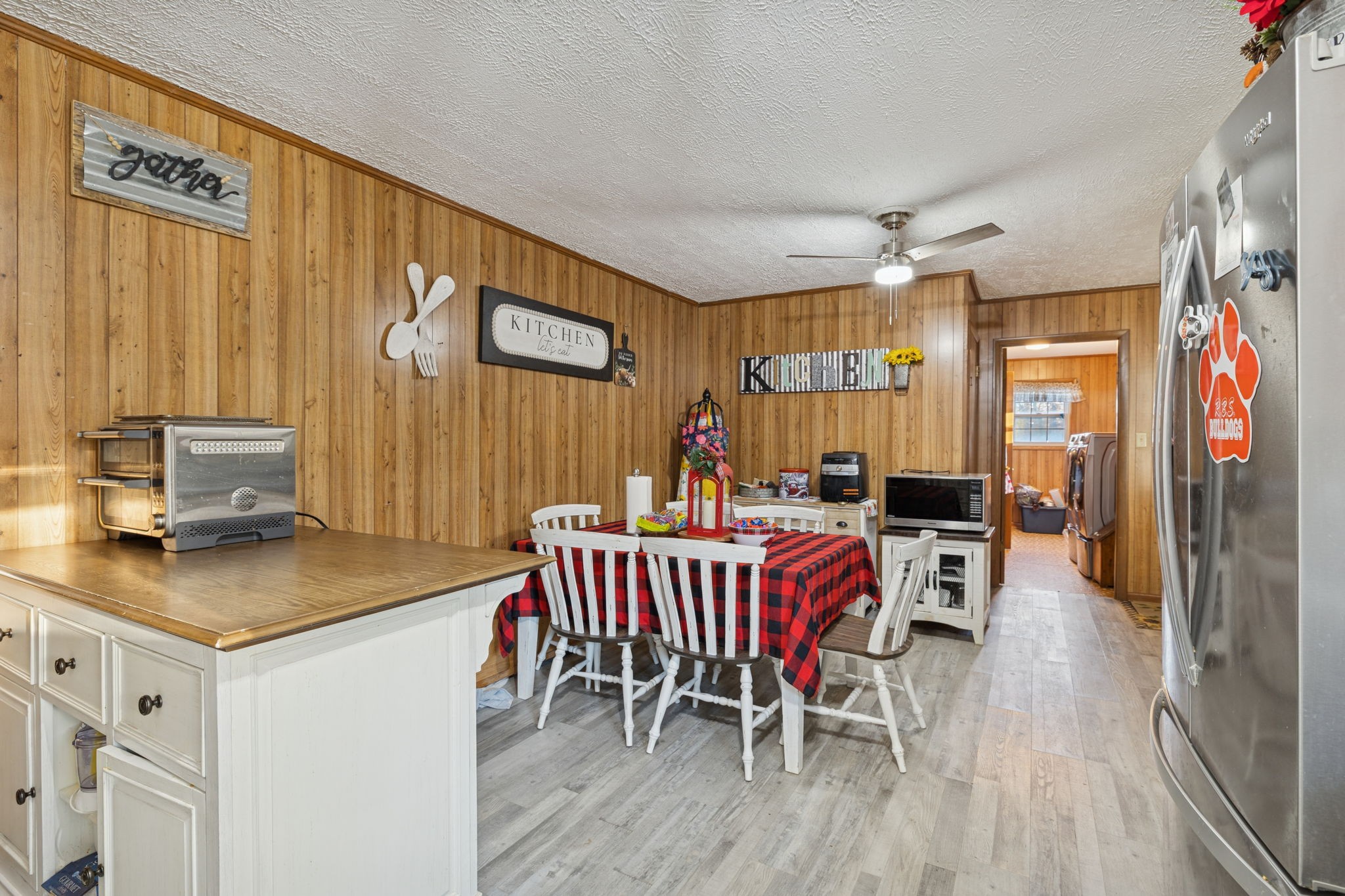 535 Gamaliel Road Red Boiling Springs, TN 37150 - Photo 11 of 30 a view of a dining room with furniture window and wooden floor