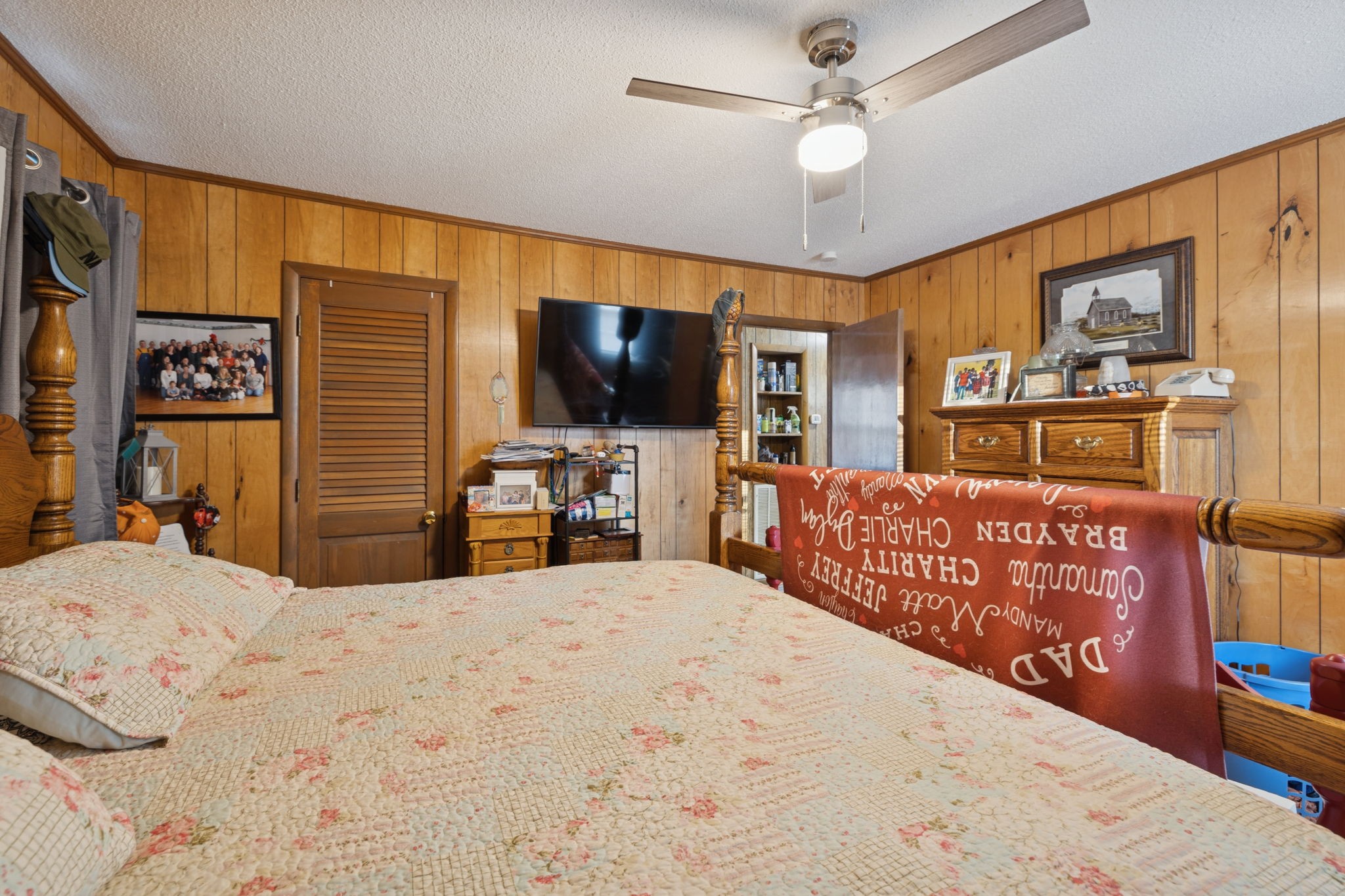 535 Gamaliel Road Red Boiling Springs, TN 37150 - Photo 21 of 30 a bedroom with a bed and a flat screen tv