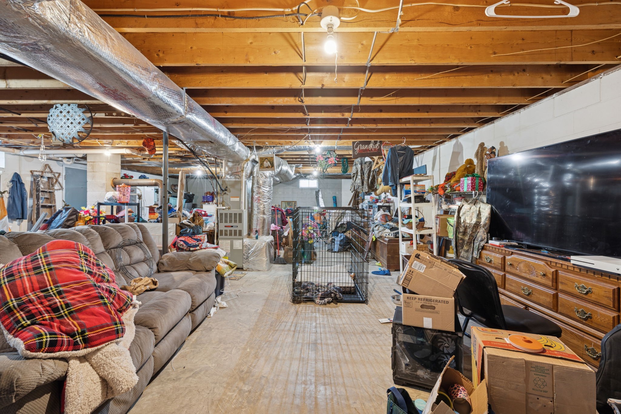 535 Gamaliel Road Red Boiling Springs, TN 37150 - Photo 25 of 30 a living room with lots of furniture and a flat screen tv