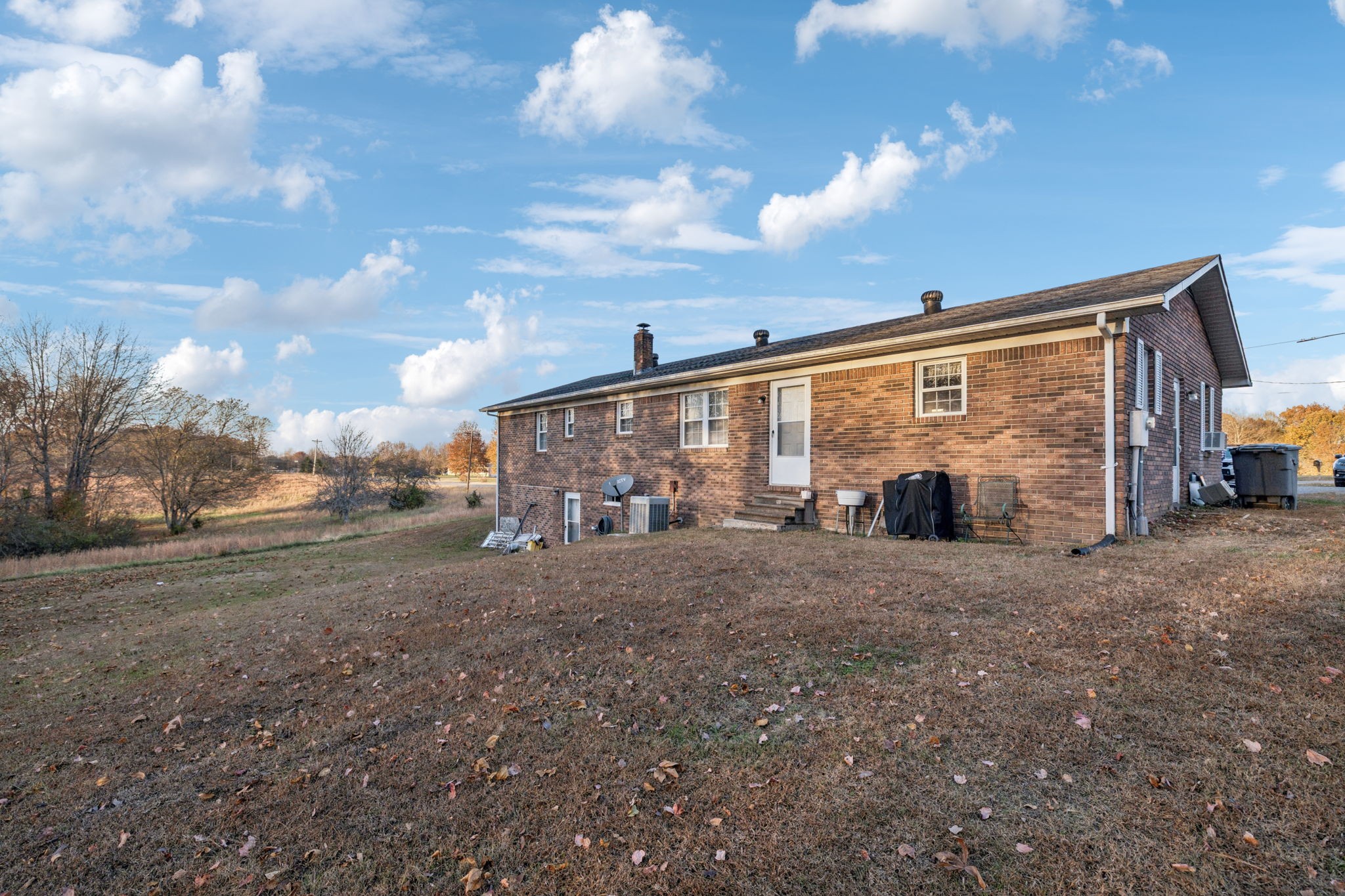 535 Gamaliel Road Red Boiling Springs, TN 37150 - Photo 30 of 30 a view of a house with backyard and roof