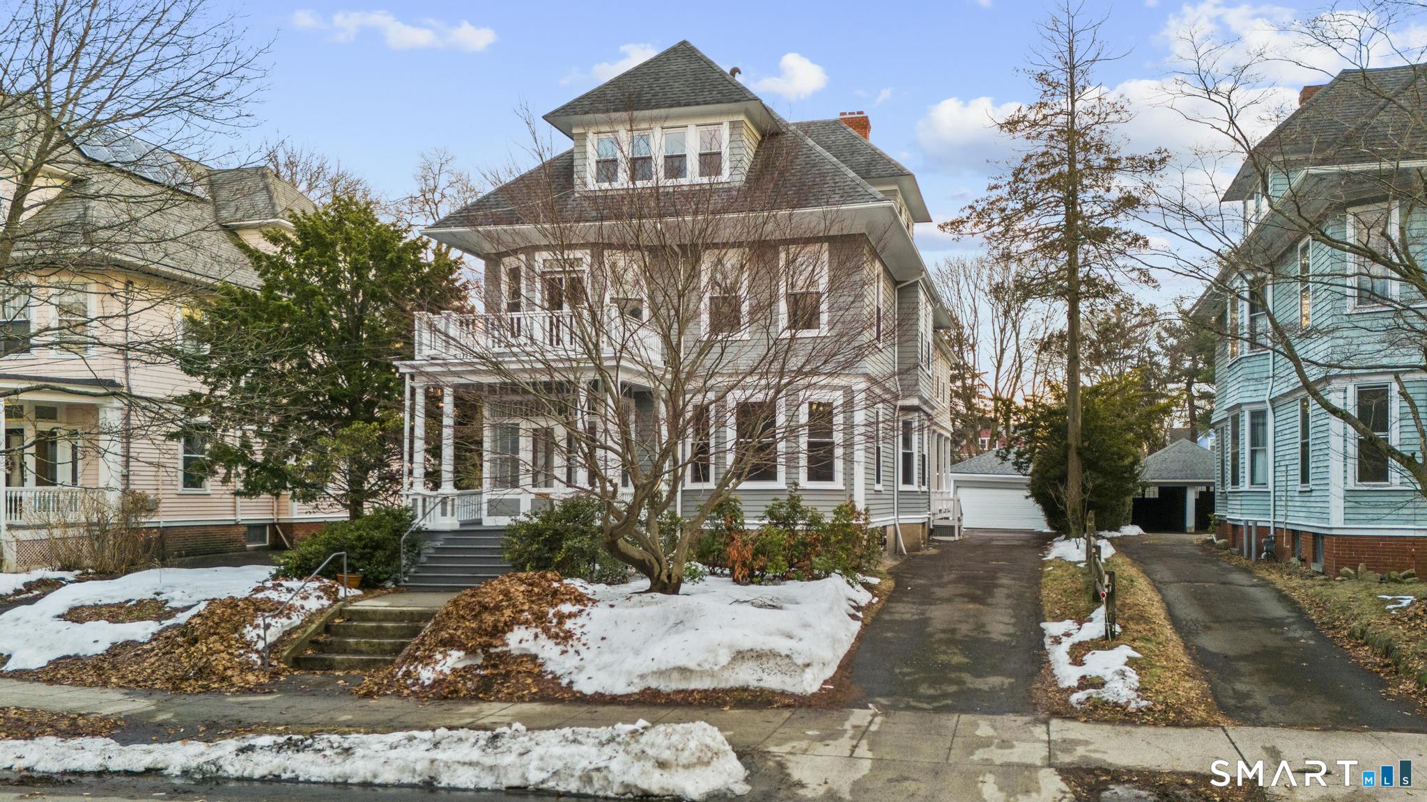 74 Cold Spring Street New Haven, CT 06511 - Photo 2 of 40 a view of a building with a yard