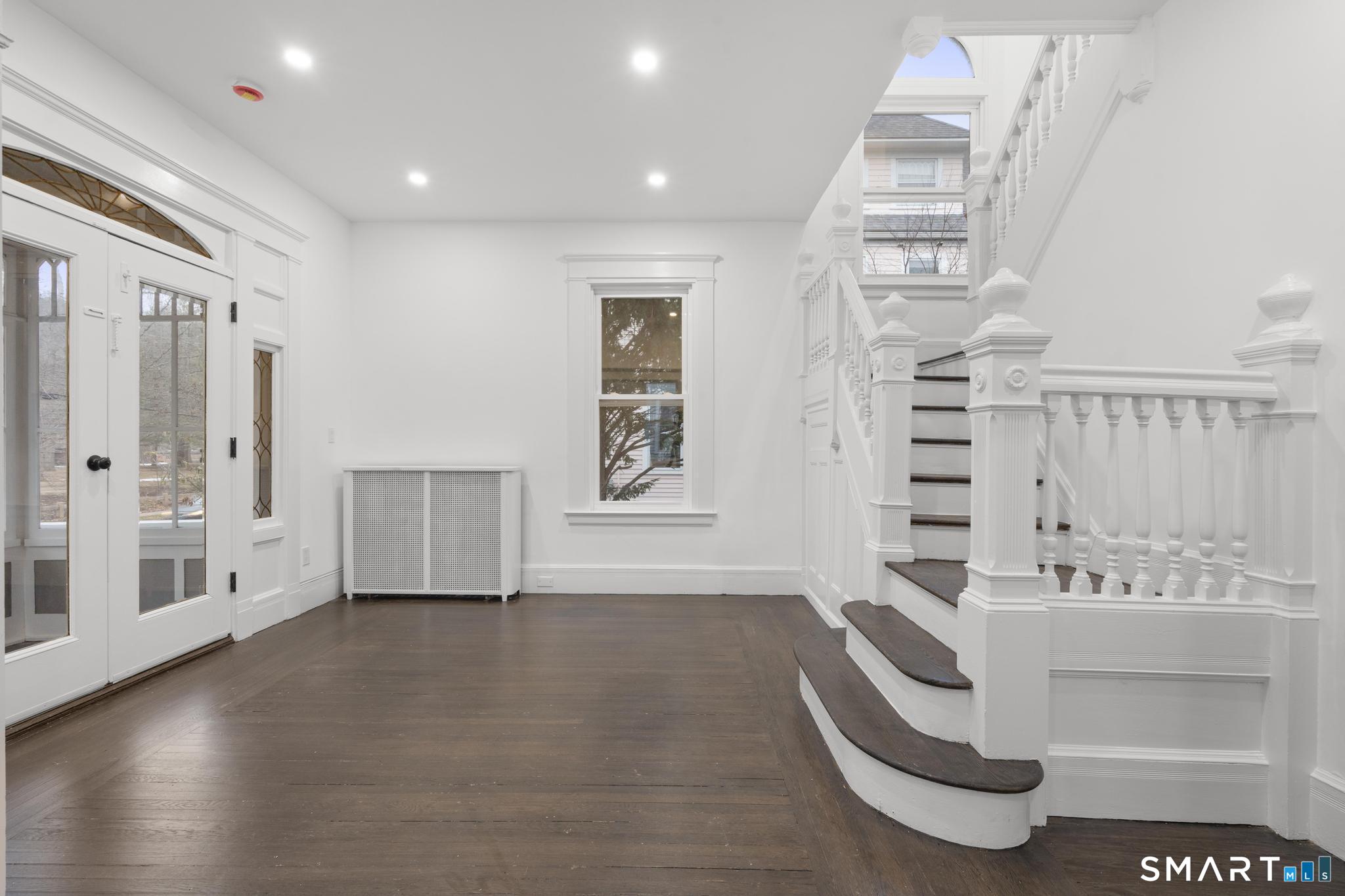 74 Cold Spring Street New Haven, CT 06511 - Photo 3 of 40 a spacious bathroom with a bathtub and a shower
