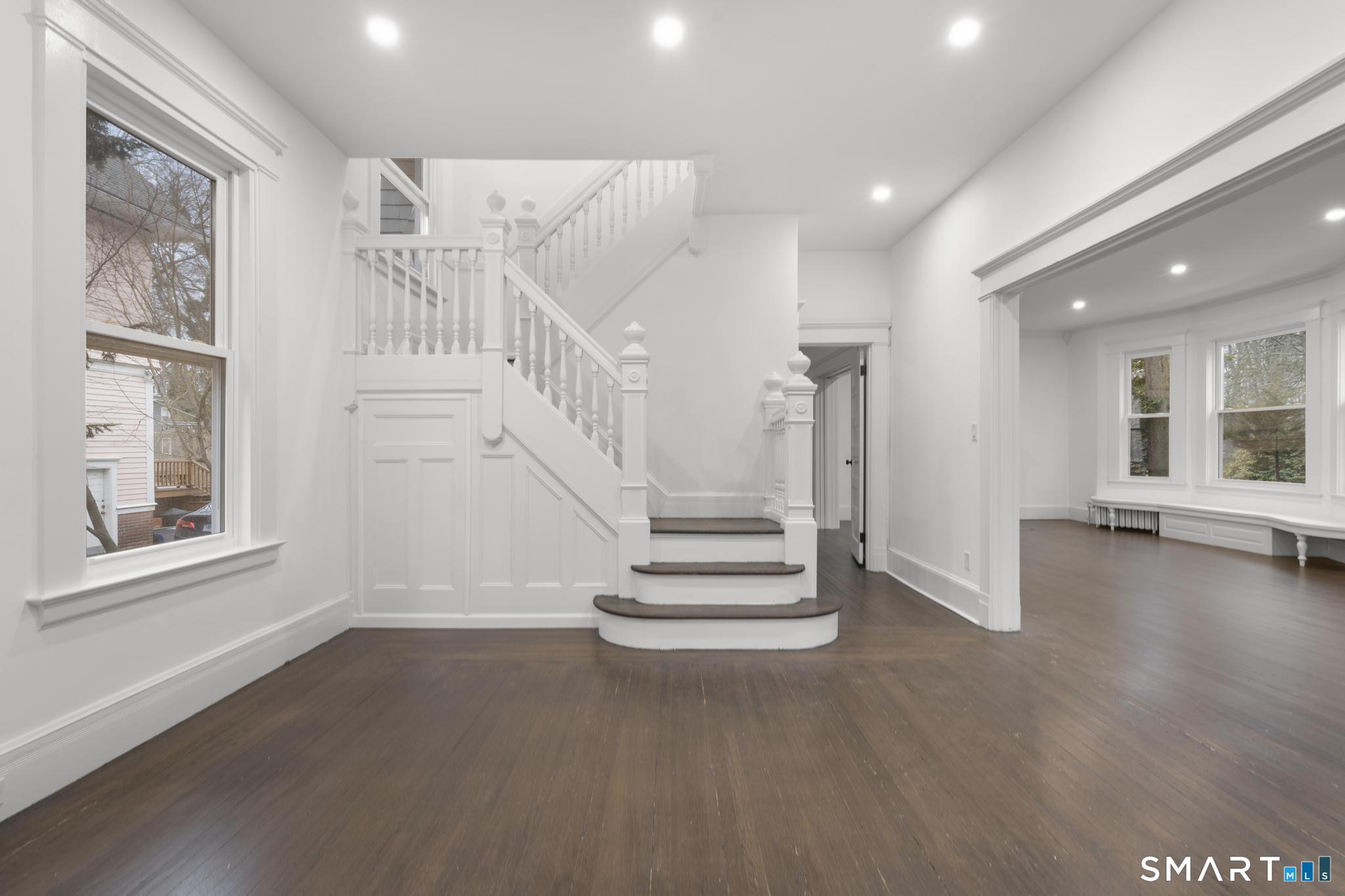 74 Cold Spring Street New Haven, CT 06511 - Photo 4 of 40 a view of an entryway with wooden floor