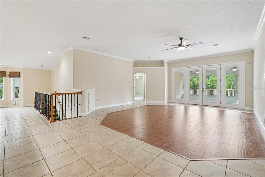 2342 Robert D Road Mount Dora, FL 32757 - Photo 12 of 44 a view of an empty room with a window
