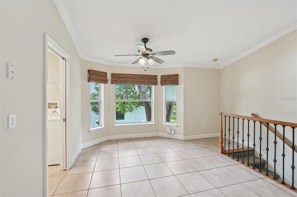 2342 Robert D Road Mount Dora, FL 32757 - Photo 18 of 44 a view of an empty room with a window