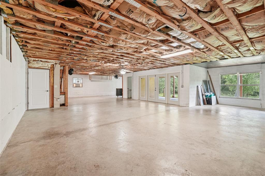 2342 Robert D Road Mount Dora, FL 32757 - Photo 35 of 44 a view of an empty room with a window