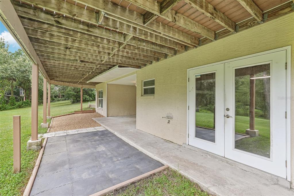 2342 Robert D Road Mount Dora, FL 32757 - Photo 41 of 44 a porch with view of outdoor space