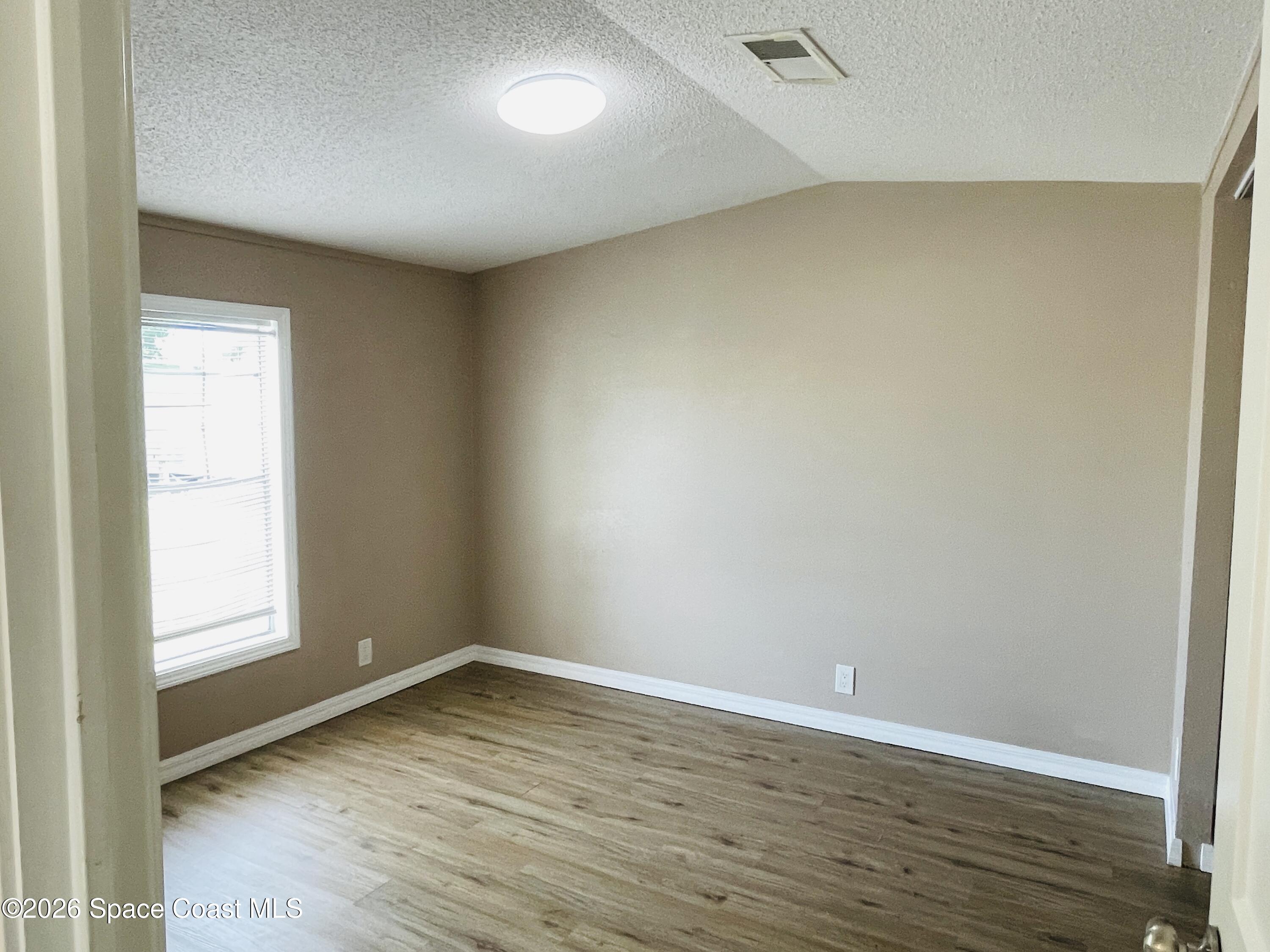 2508 Chatham Way Northeast Palm Bay, FL 32905 - Photo 11 of 14 Guest bedroom