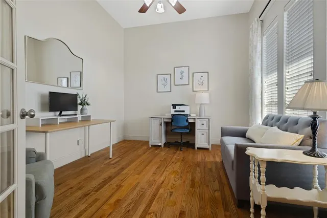 a bed room with a bed and a chair