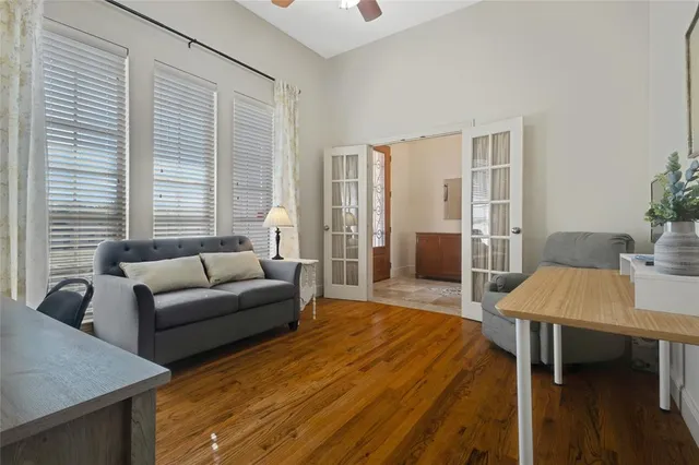 a living room with furniture and a table