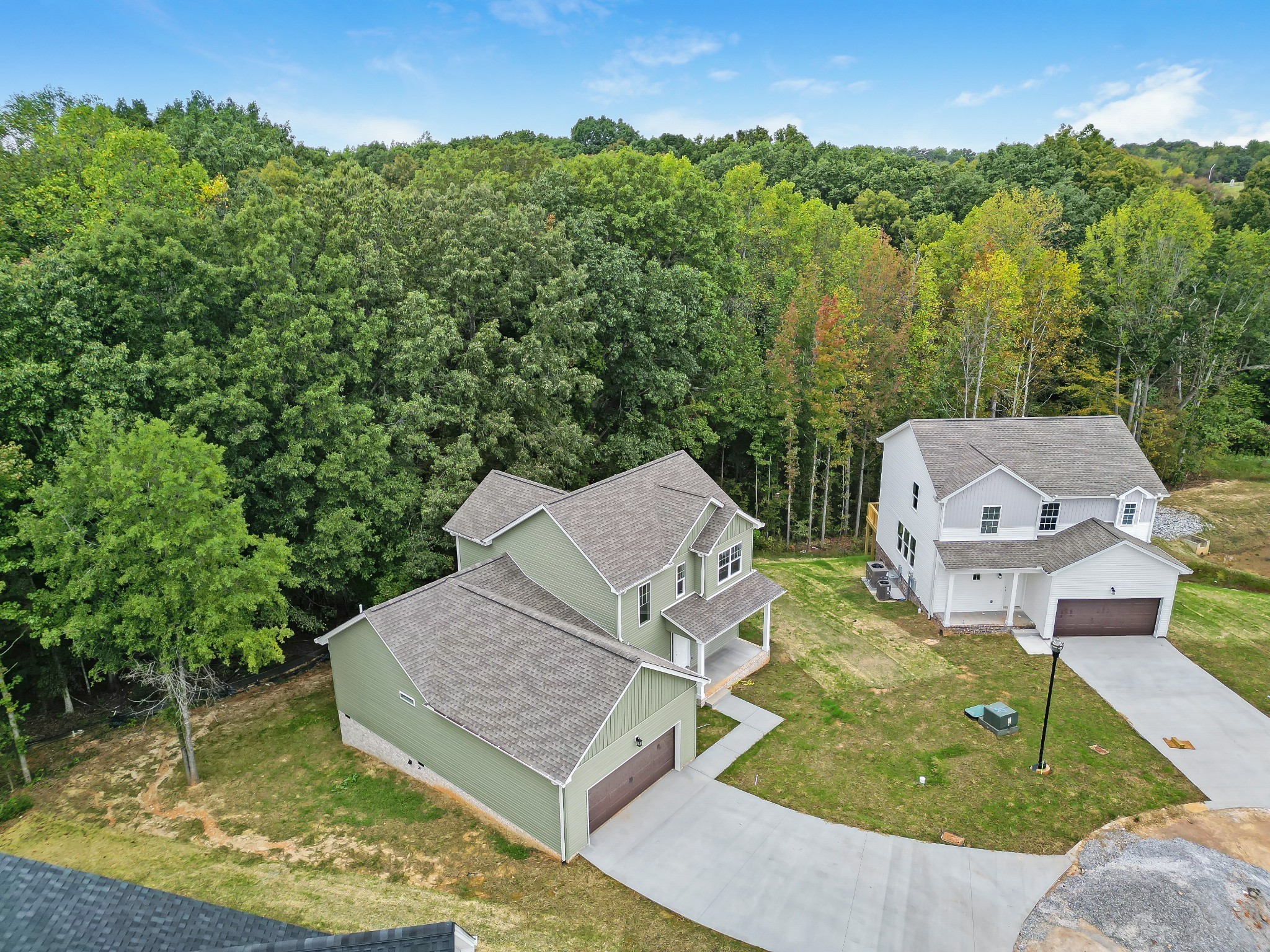 2074 Morgan Court Springfield, TN 37172 - Photo 3 of 20 aerial view of a house with garden space and trees in the background