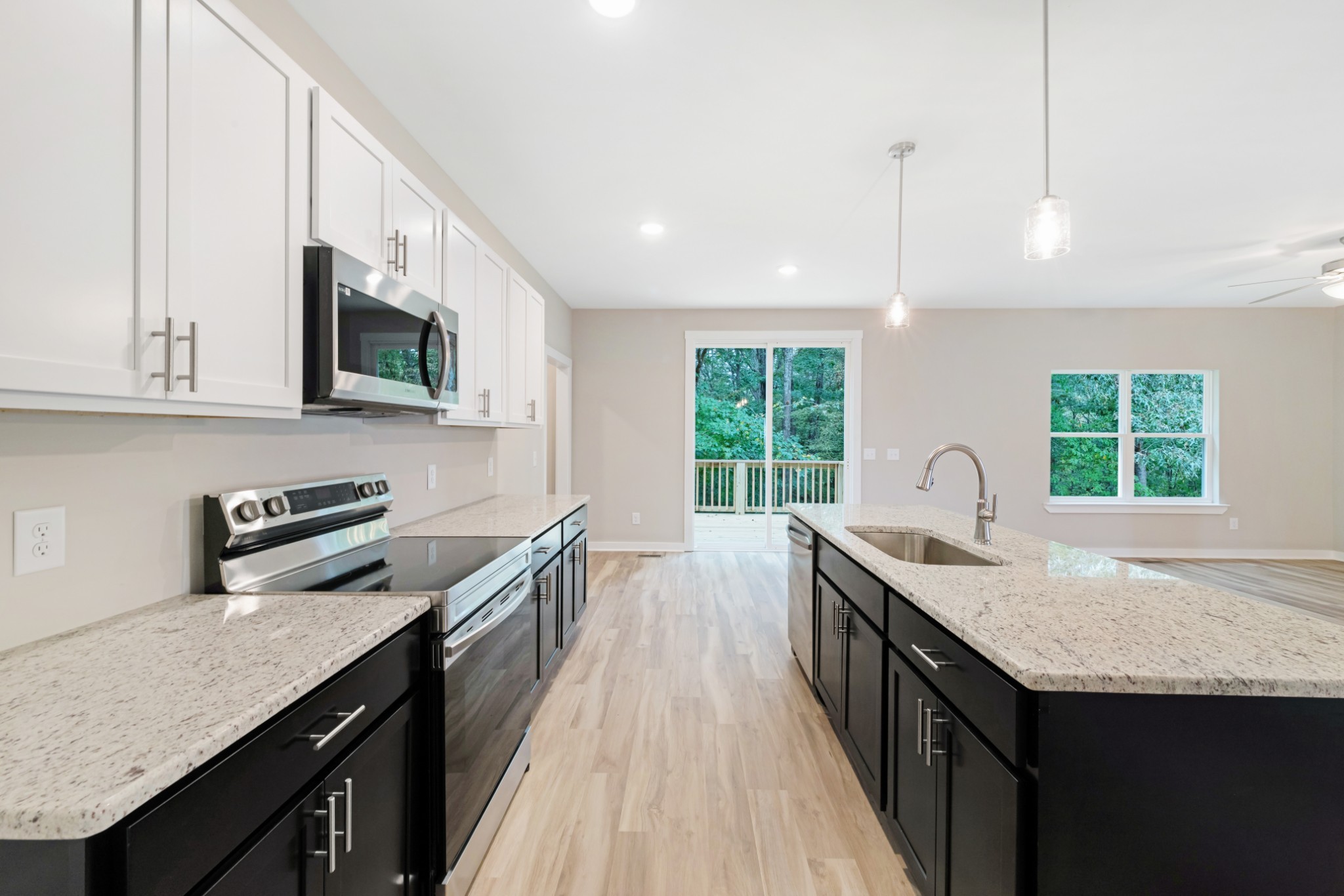 2074 Morgan Court Springfield, TN 37172 - Photo 8 of 20 a kitchen with granite countertop stainless steel appliances sink stove top oven and cabinets